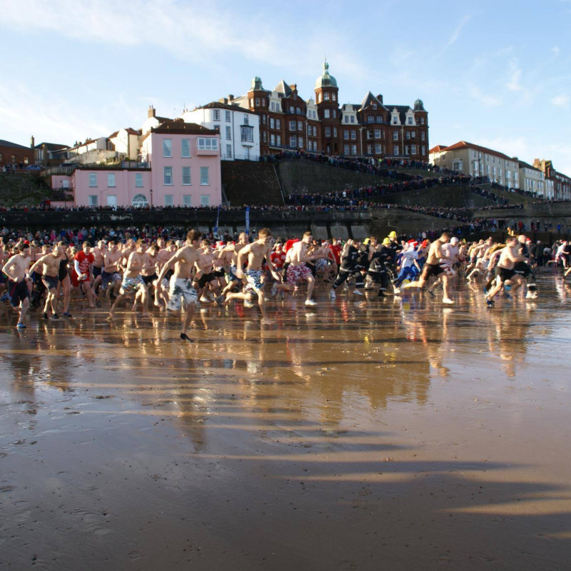Cromer Boxing Day Dip, The Promenade, Cromer, Norfolk, NR27 9HW | The event of the year and one that you've all been waiting for. Organised by North Norfolk Beach Runners this event is firmly fixed in the Christmas Calendar. | swimming, dip, boxing, day, christmas, cromer, north norfolk coast, charity, RNLI, fundraiser, fund, raising