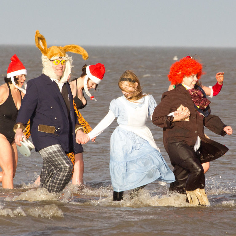 Hunstanton Christmas Day Swim, Hunstanton Promenade (by the Oasis Leisure Centre), Hunstanton, Norfolk | What better way to spend Christmas morning than frolicking in the sea with over a hundred other people (and many hundred spectators) dressed in a variety of bizarre and outrageous costumes! | swimming, dip, day, christmas, cromer, north norfolk coast, charity, round, table, fundraiser, fund, raising