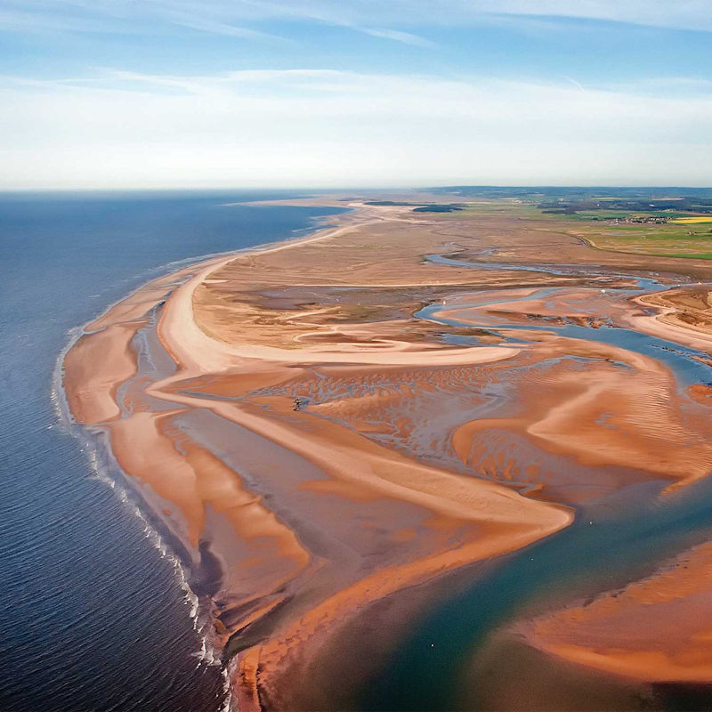 Solstice Beach Yoga + Sea Swims, Brancaster Beach, Main Road, Brancaster, Norfolk, PE31 8AX | Join us for gentle yoga on the beach followed by a dip at high tide. | yoga, beach yoga, solstice, sea swim, swimming, wild swimming