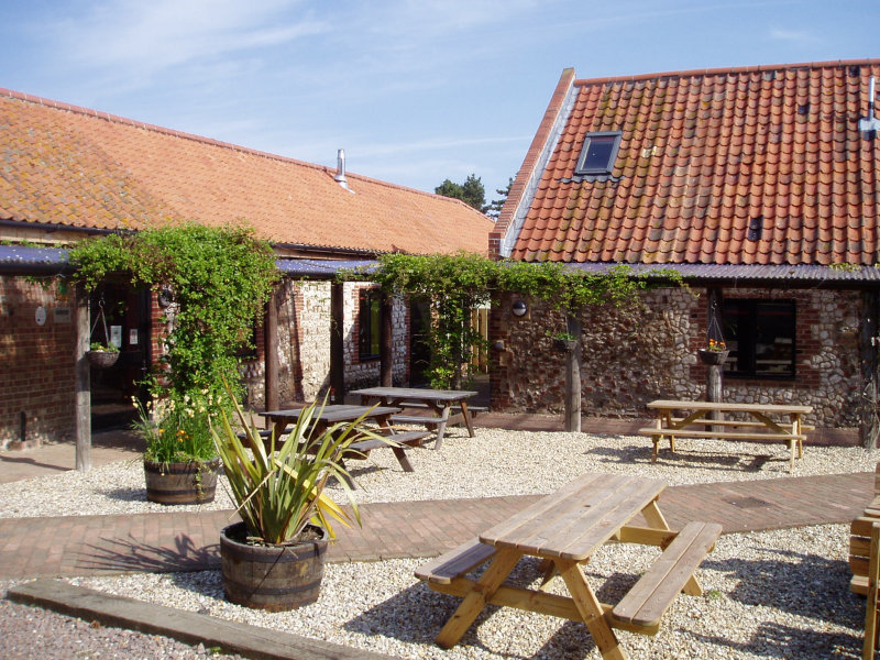 Private rooms self catering accommodation, BBQ courtyard in The Stables - Deepdale Camping & Rooms