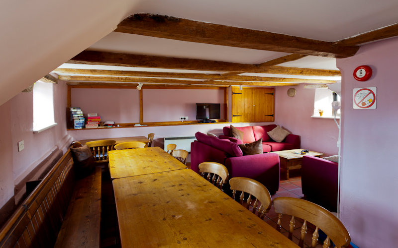 Dining and sitting room in Deepdale Granary - Self catering group accommodation for up to 16 people on the beautiful North Norfolk Coast